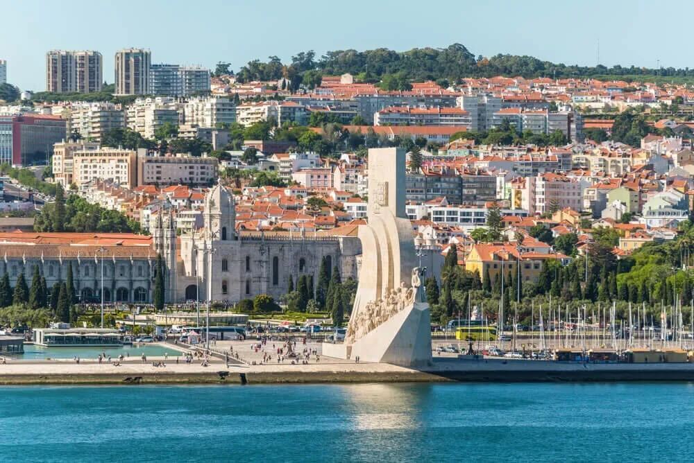 Belem waterfront in Lisbon — Praca do Imperio esplanade and MAAT museum terrace overlooking the Tagus river used for large outdoor events and exclusive sunset receptions