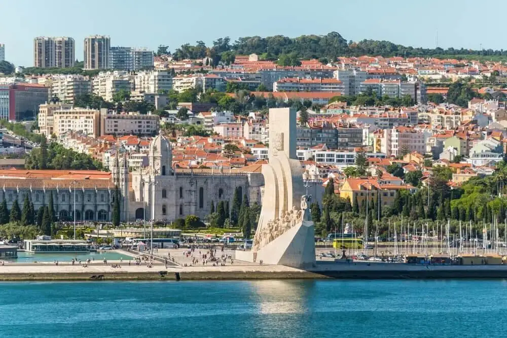 Belem waterfront in Lisbon — Praca do Imperio esplanade and MAAT museum terrace overlooking the Tagus river used for large outdoor events and exclusive sunset receptions