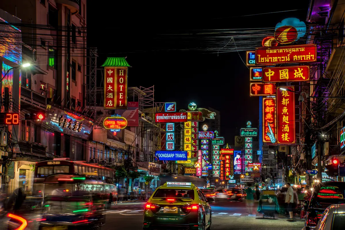 Neon signs along Yaowarat Road at night in Chinatown, Bangkok, Thailand