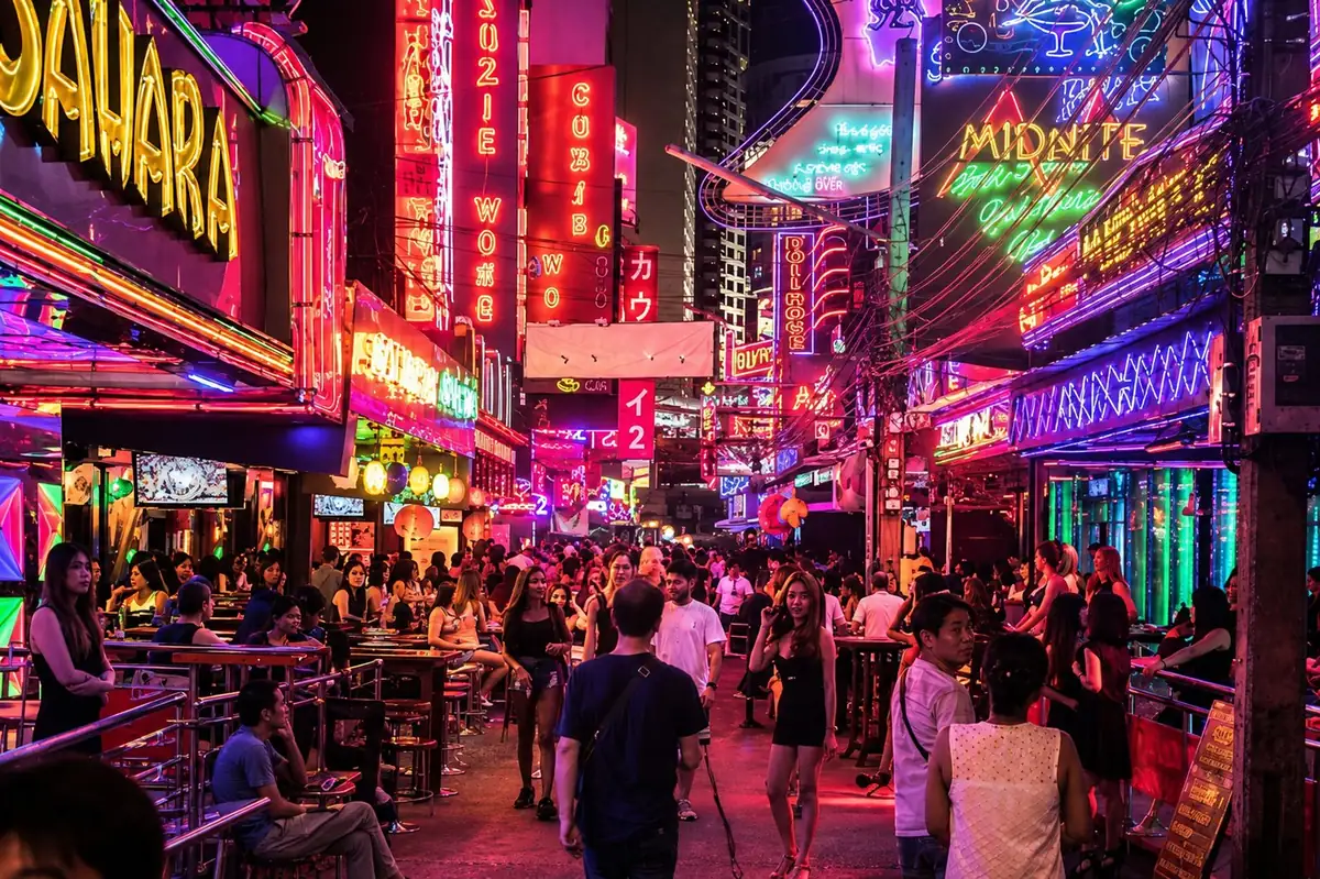 Neon nightlife signage in the Nana–Soi 11 entertainment district of Bangkok, Thailand