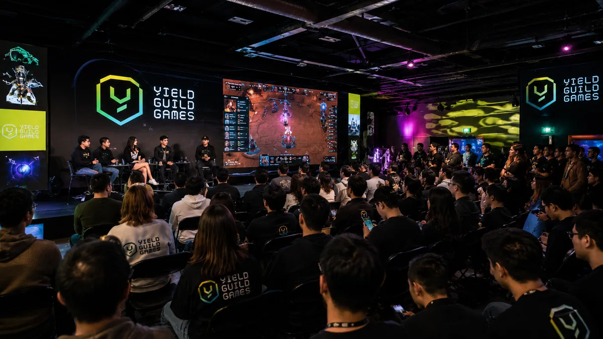 Panelists and audience at the Yield Guild Games Web3 gaming meetup in Paris