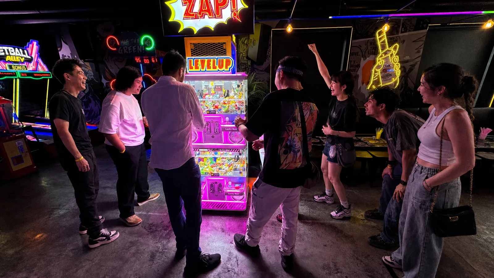 Guests playing arcade games at Baseline BLAST Arcade Night during TOKEN2049 Singapore, produced by CH3 Agency