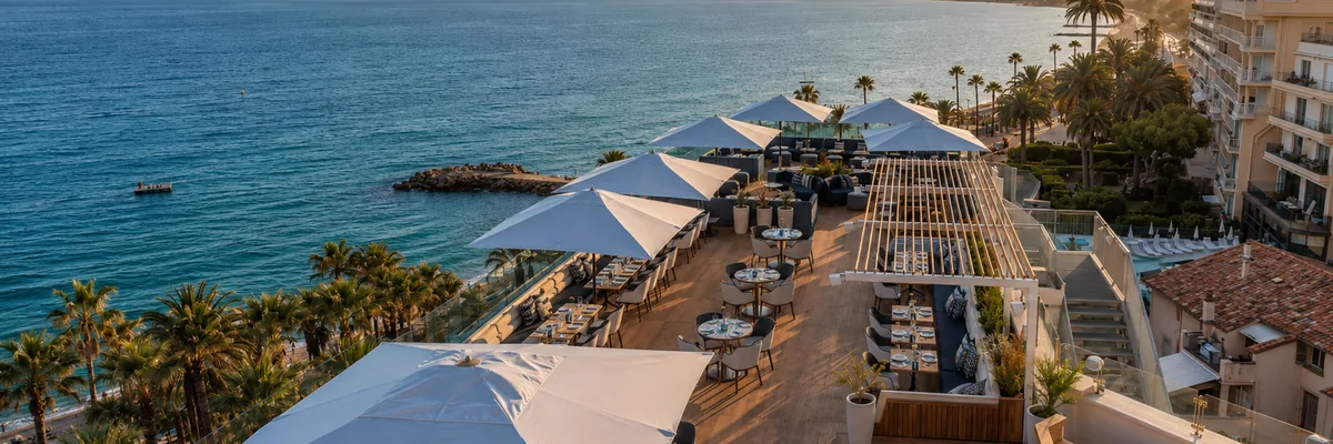 The rooftop terrace at Canopy by Hilton Cannes above the bay