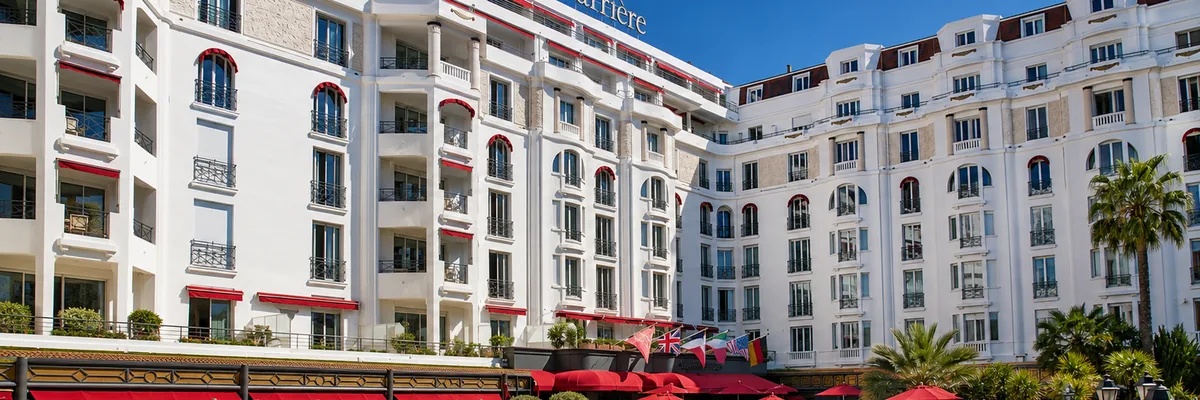 The pool terrace and facade of Hotel Barriere Le Majestic, Cannes