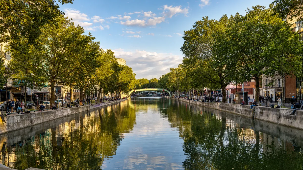 Canal Saint-Martin with its iron footbridge and tree-lined quaysides, Paris
