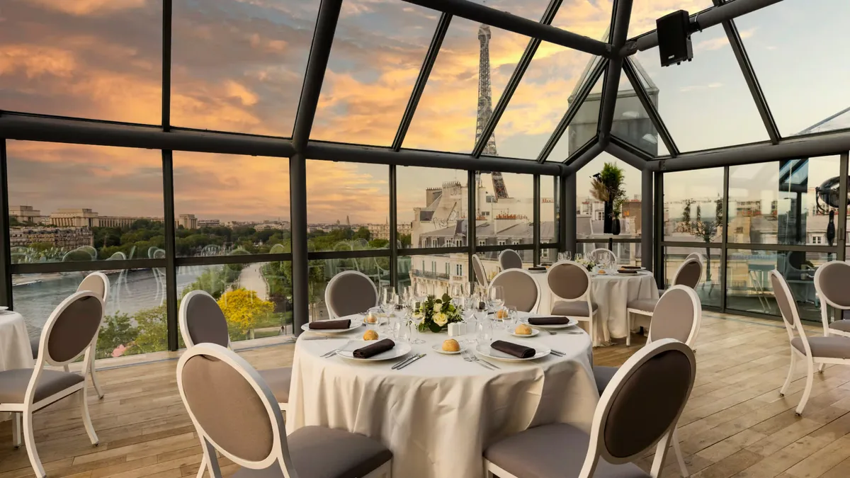 A planted rooftop terrace with the Eiffel Tower beyond, Paris 15th
