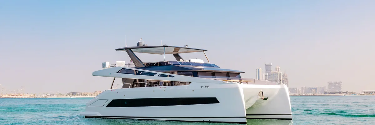 Private catamaran yacht off Dubai Harbour, Dubai, United Arab Emirates